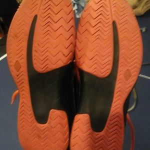 Nike zoom cage 2.Men's sz 9, women 10.5.Bright orange and black. Worn couple X's